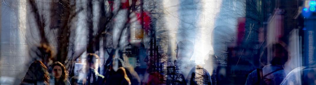 A multiple exposure shot of students on Temple's campus.